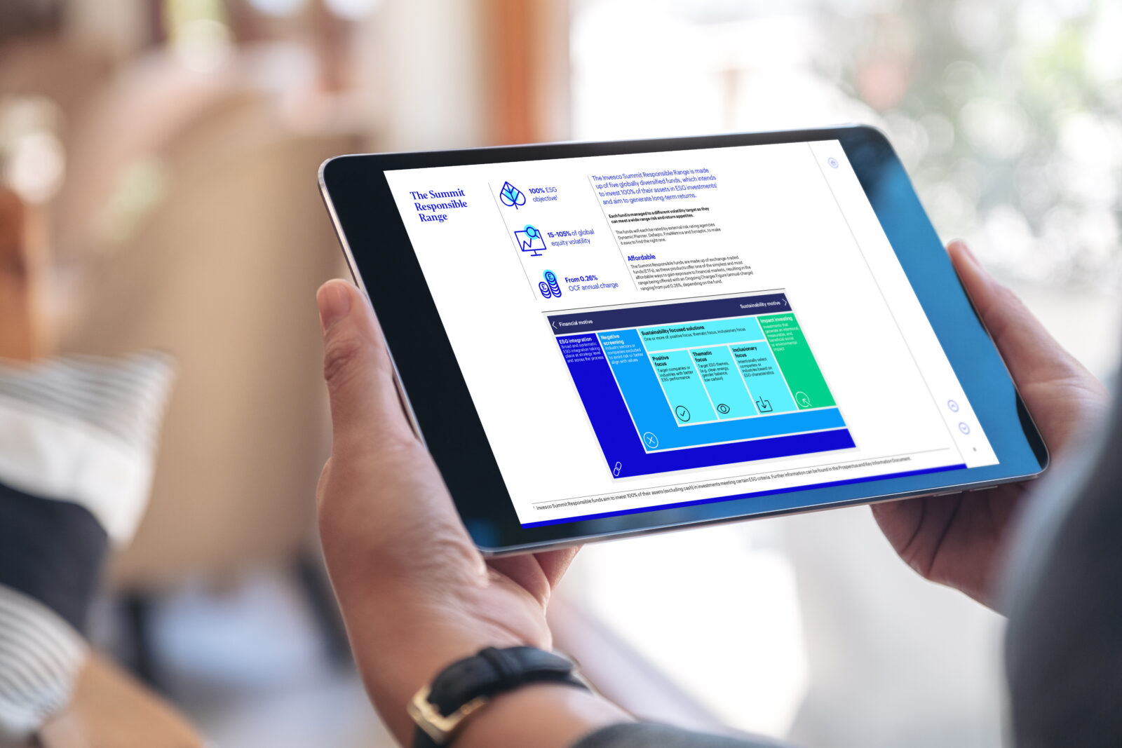 Mockup image of a woman's hands holding black tablet pc with bla